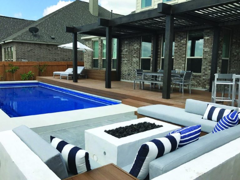 Claremont fiberglass pool, small rectangular pool with stone border and gravel landscaping