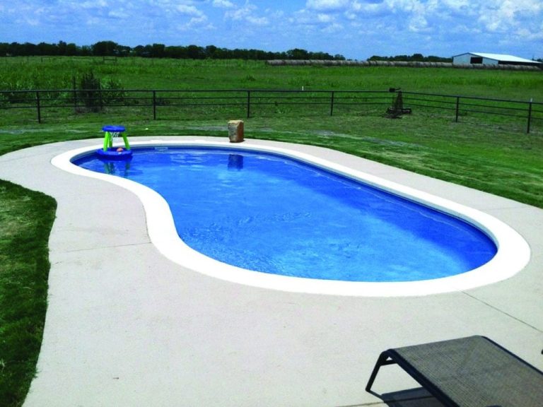Jamaica 12 fiberglass pool, freeform oval design with open pasture view