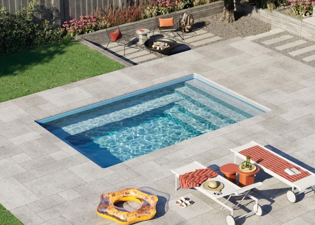 Milan 10.16 fiberglass pool, compact rectangular plunge pool with wide entry bench